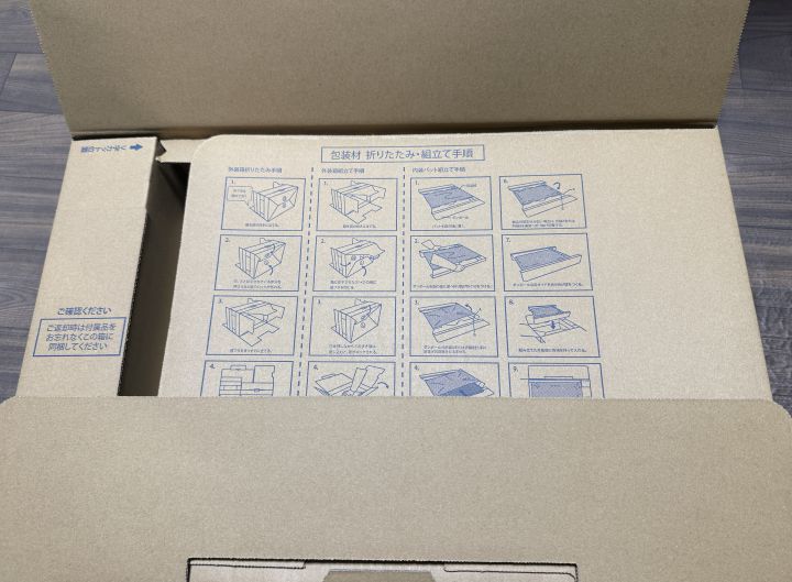 Qualitの中古ノートPC梱包。エア緩衝材でDell Latitude 7390がしっかり固定されている様子